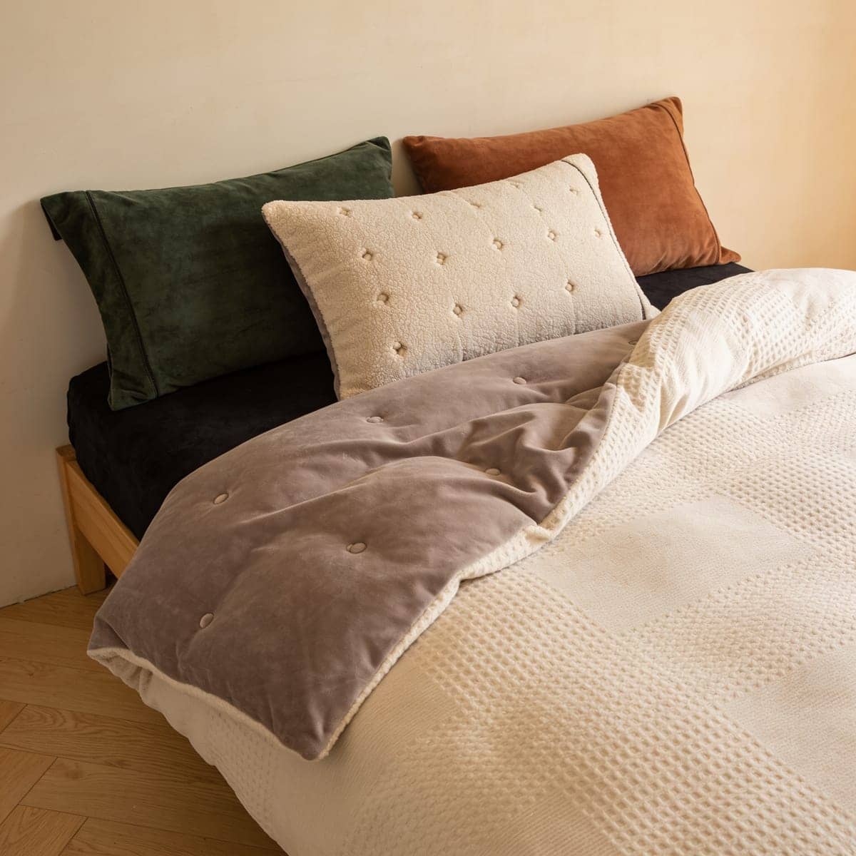 reversible comforter set showing a solid side and a patterned side