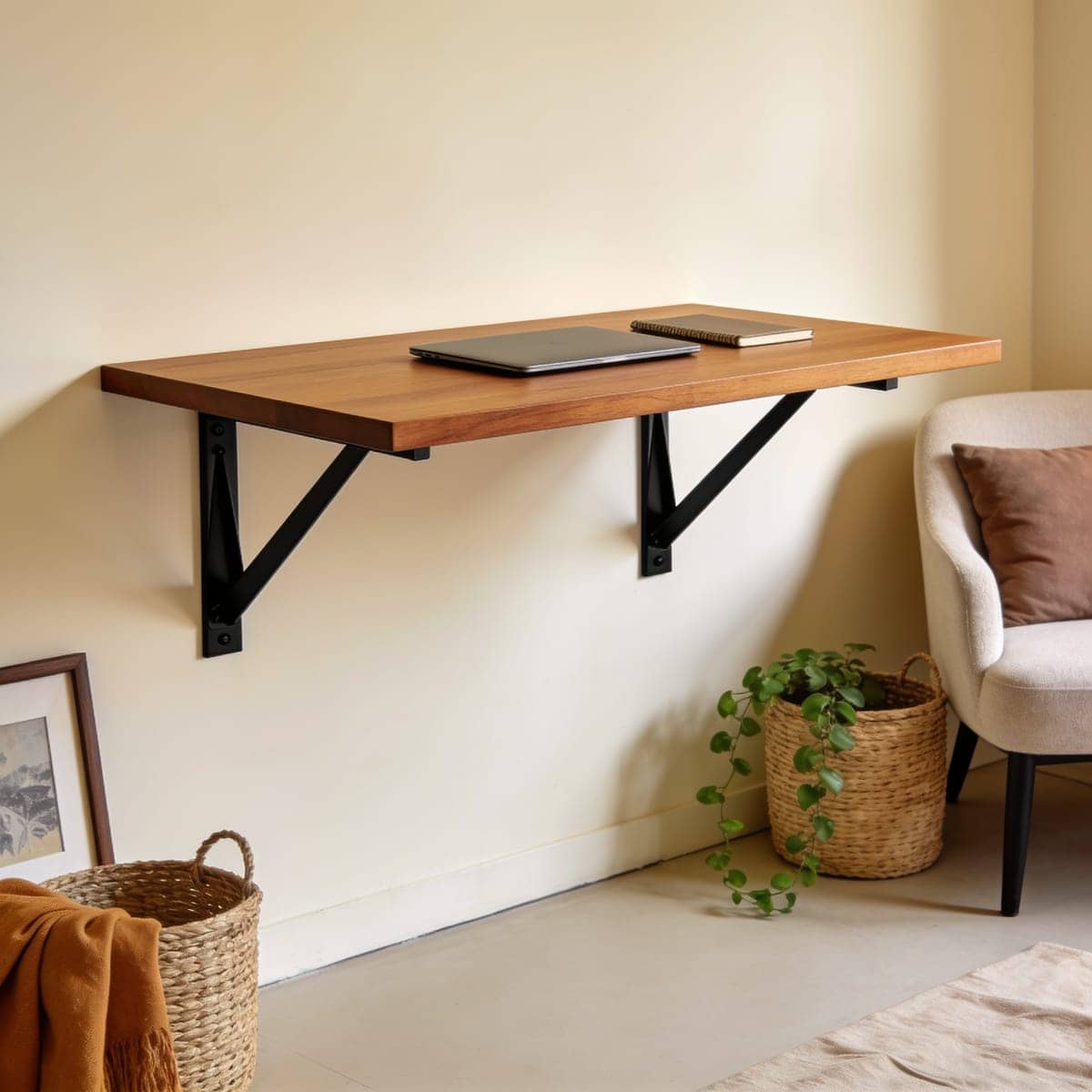wall mounted fold down desk open against a small apartment wall