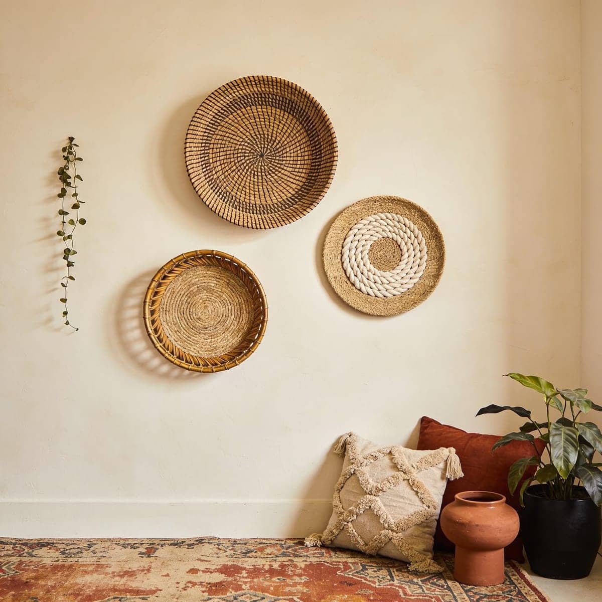 set of woven wall baskets arranged as decor