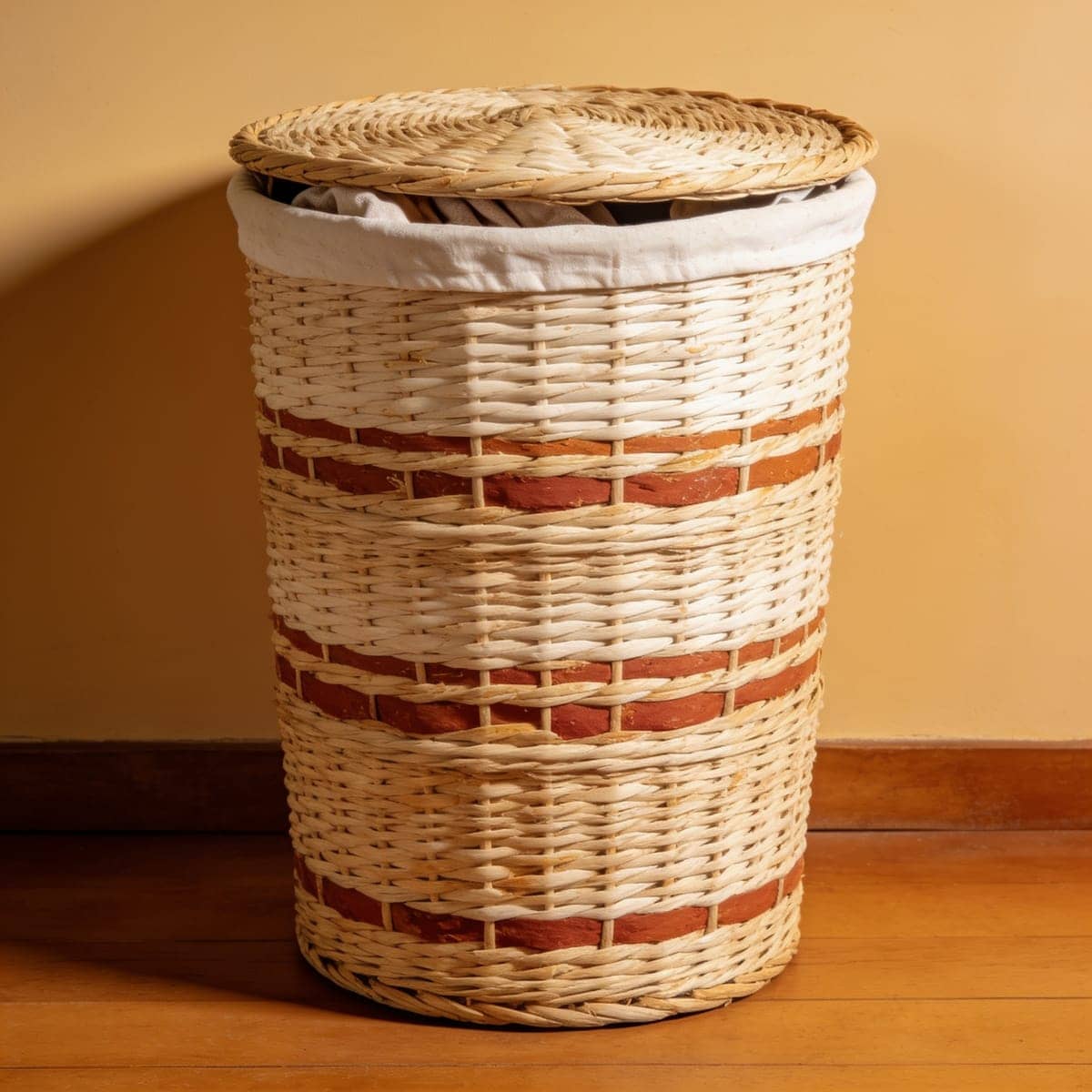 tall seagrass laundry hamper with a lid